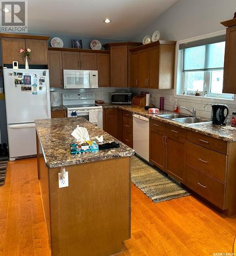 3 401 3Rd Avenue E, Assiniboia, SK - Indoor Photo Showing Kitchen With Double Sink