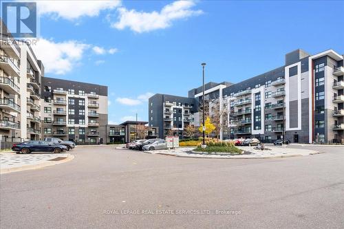 535 - 102 Grovewood Common, Oakville, ON - Outdoor With Balcony With Facade