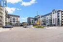 535 - 102 Grovewood Common, Oakville, ON  - Outdoor With Balcony With Facade 