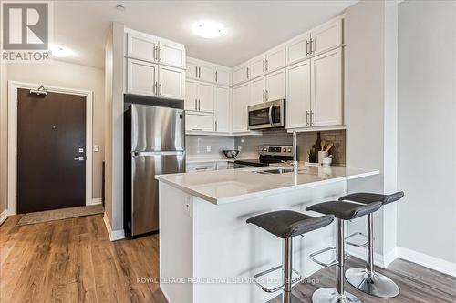 535 - 102 Grovewood Common, Oakville, ON - Indoor Photo Showing Kitchen With Stainless Steel Kitchen With Upgraded Kitchen