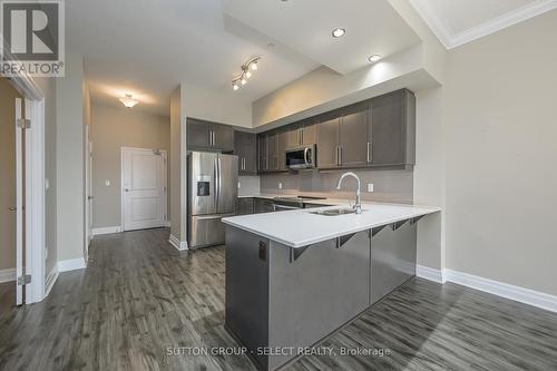 1110 - 240 Villagewalk Boulevard, London, ON - Indoor Photo Showing Kitchen With Stainless Steel Kitchen With Double Sink