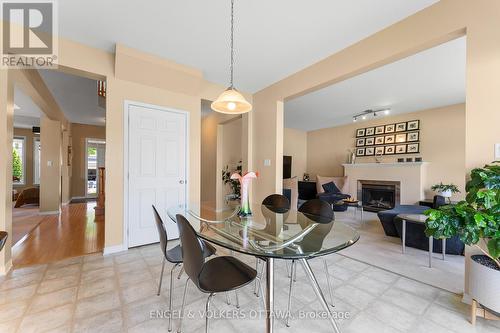 2 Knotwood Court, Ottawa, ON - Indoor Photo Showing Dining Room With Fireplace