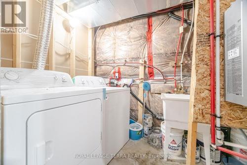 1407 Chretien Street, Milton, ON - Indoor Photo Showing Laundry Room