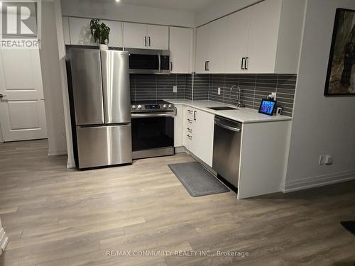 2309 - 20 Meadowglen Place, Toronto, ON - Indoor Photo Showing Kitchen