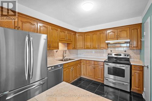 404 - 301 Frances Avenue, Hamilton, ON - Indoor Photo Showing Kitchen With Stainless Steel Kitchen With Double Sink