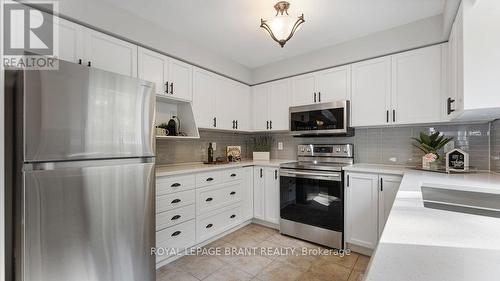 5 - 7 Southside Place, Hamilton, ON - Indoor Photo Showing Kitchen With Stainless Steel Kitchen