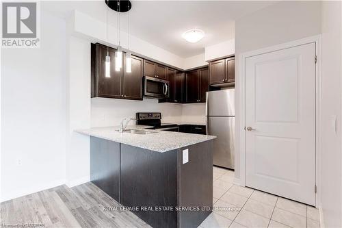 205 - 2388 Khalsa Gate, Oakville, ON - Indoor Photo Showing Kitchen With Double Sink