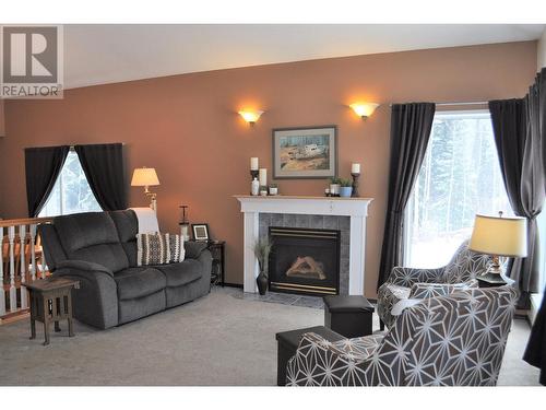 7082 16 Highway, Smithers, BC - Indoor Photo Showing Living Room With Fireplace