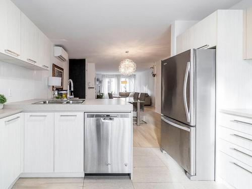 Kitchen - 3-494 Av. Mousseau-Vermette, Dorval, QC - Indoor Photo Showing Kitchen With Double Sink