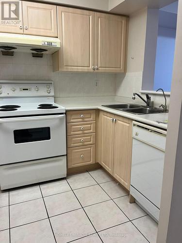 802 - 5039 Finch Avenue E, Toronto, ON - Indoor Photo Showing Kitchen With Double Sink