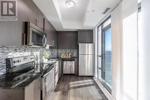 508 - 45 Yorkland Boulevard, Brampton, ON - Indoor Photo Showing Kitchen With Upgraded Kitchen