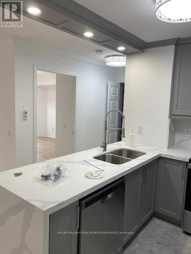 1008 - 35 Kingsbridge Garden Circle, Mississauga, ON - Indoor Photo Showing Kitchen With Double Sink