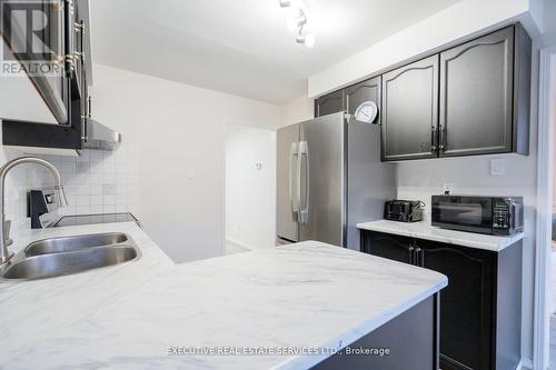 12 Cedarwood Crescent, Brampton, ON - Indoor Photo Showing Kitchen With Double Sink