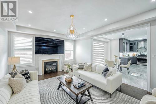 7 Sewell Crescent, Ajax, ON - Indoor Photo Showing Living Room With Fireplace