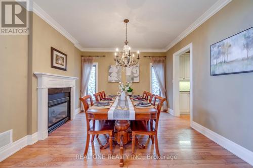 1033 Kestell Boulevard, Oakville, ON - Indoor Photo Showing Dining Room With Fireplace