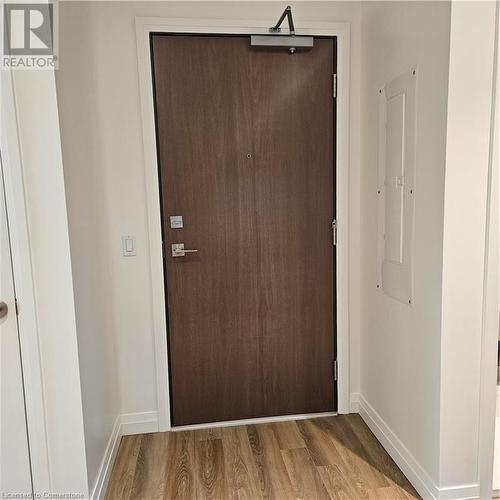 Entryway featuring electric panel and hardwood / wood-style flooring - 525 New Dundee Road Unit# 602, Kitchener, ON - Indoor Photo Showing Other Room