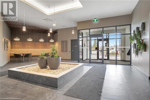 View of building lobby - 525 New Dundee Road Unit# 602, Kitchener, ON - Indoor Photo Showing Other Room