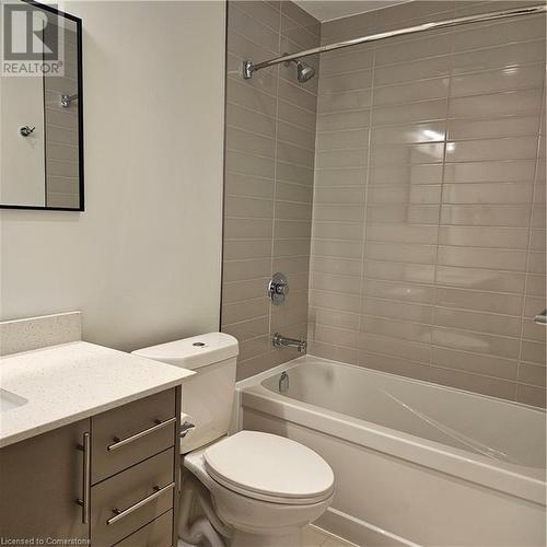 Full bathroom featuring vanity, toilet, and tiled shower / bath - 525 New Dundee Road Unit# 602, Kitchener, ON - Indoor Photo Showing Bathroom