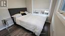 101 - 6705 Cropp Street, Niagara Falls (212 - Morrison), ON  - Indoor Photo Showing Bedroom 