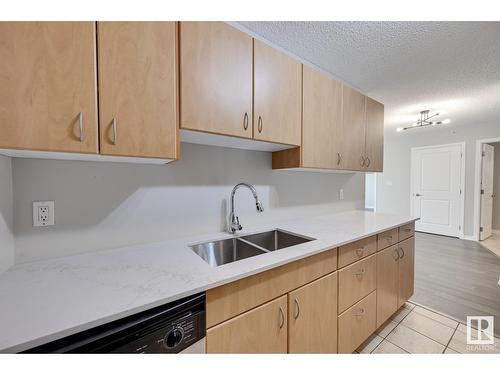 10180 104 St Nw, Edmonton, AB - Indoor Photo Showing Kitchen With Double Sink