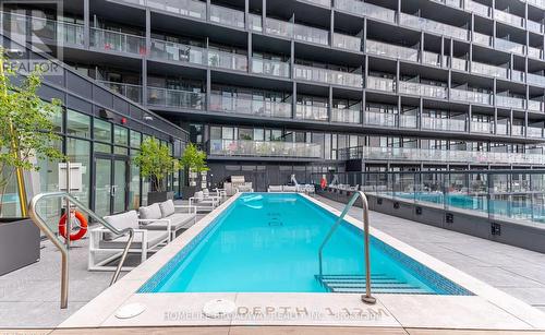 B610 - 3200 Dakota Common Road, Burlington, ON - Outdoor With In Ground Pool With Balcony