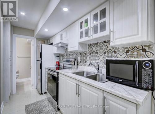 537 Edenbrook Hill Drive W, Brampton, ON - Indoor Photo Showing Kitchen With Double Sink