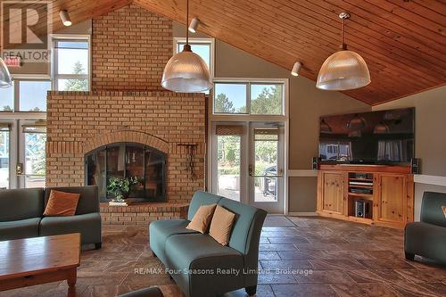 9 - 2 Ramblings Way, Collingwood, ON - Indoor Photo Showing Living Room With Fireplace