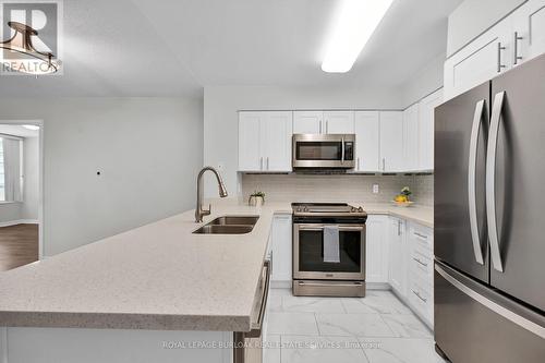 709 - 30 Grand Trunk Crescent, Toronto, ON - Indoor Photo Showing Kitchen With Double Sink