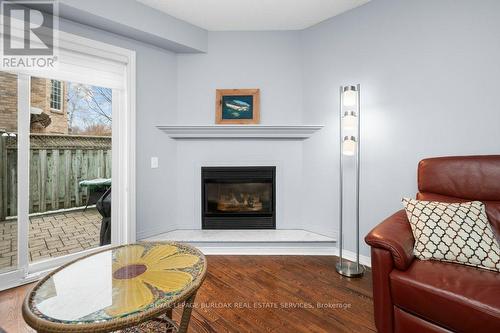 78 - 3333 New Street, Burlington, ON - Indoor Photo Showing Living Room With Fireplace