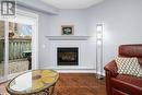 78 - 3333 New Street, Burlington, ON  - Indoor Photo Showing Living Room With Fireplace 