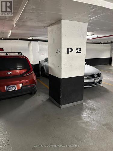 1011 - 38 Joe Shuster Way, Toronto, ON - Indoor Photo Showing Garage