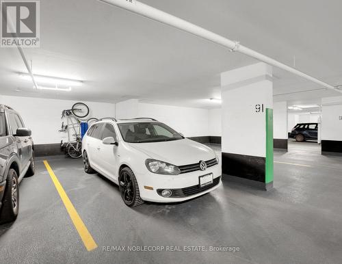 914 - 61 Heintzman Street S, Toronto, ON - Indoor Photo Showing Garage