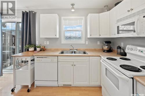 65 135 Pawlychenko Lane, Saskatoon, SK - Indoor Photo Showing Kitchen With Double Sink