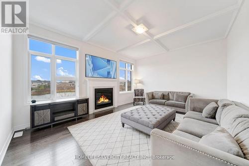 398 Spyglass Green, Oakville, ON - Indoor Photo Showing Living Room With Fireplace