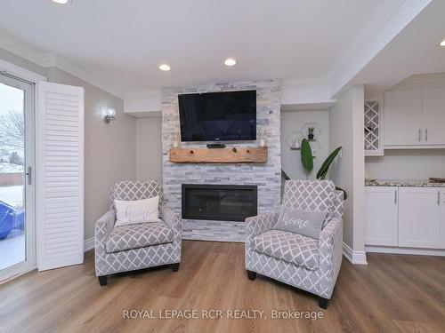 20 Joseph St, Adjala-Tosorontio, ON - Indoor Photo Showing Living Room With Fireplace