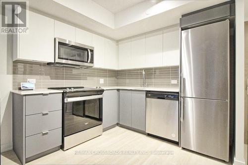 308 - 30 Tretti Way, Toronto, ON - Indoor Photo Showing Kitchen With Upgraded Kitchen