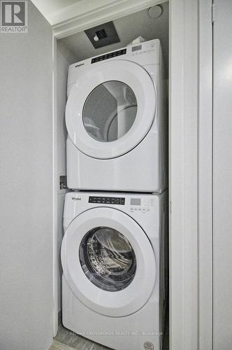 308 - 30 Tretti Way, Toronto, ON - Indoor Photo Showing Laundry Room