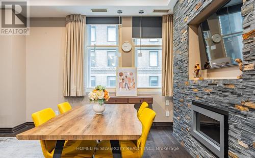 814 - 1 King Street E, Toronto, ON - Indoor Photo Showing Dining Room With Fireplace