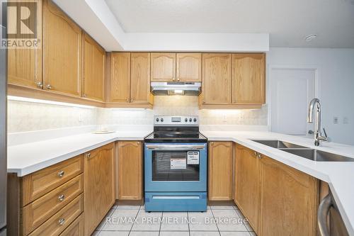 213 - 890 Sheppard Avenue W, Toronto, ON - Indoor Photo Showing Kitchen With Stainless Steel Kitchen With Double Sink