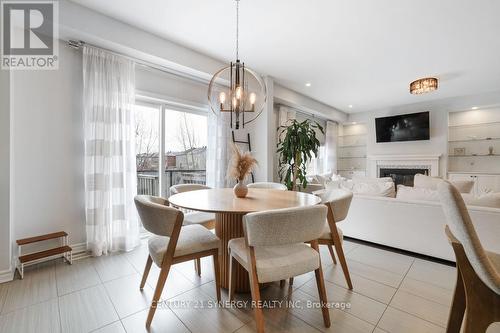 110 Westphalian Avenue, Ottawa, ON - Indoor Photo Showing Dining Room With Fireplace