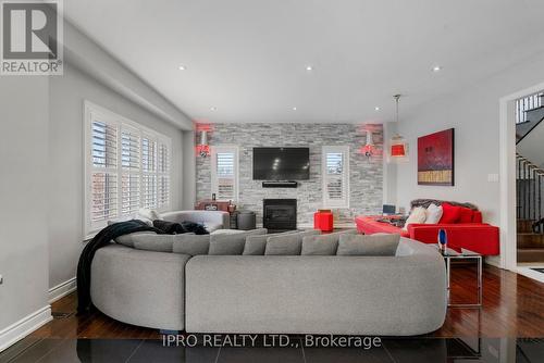 2 George Mckenzie Court, Toronto, ON - Indoor Photo Showing Living Room With Fireplace