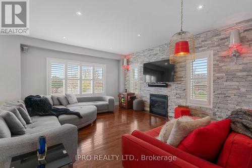 2 George Mckenzie Court, Toronto, ON - Indoor Photo Showing Living Room With Fireplace