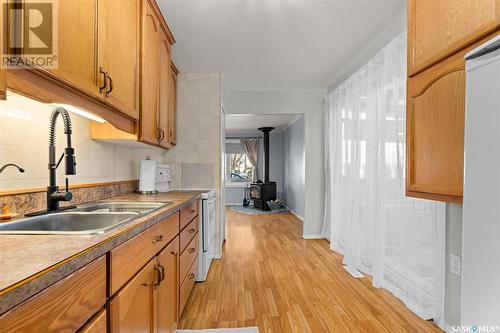 1056 Wolfe Avenue E, Moose Jaw, SK - Indoor Photo Showing Kitchen With Double Sink