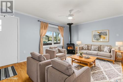 1056 Wolfe Avenue E, Moose Jaw, SK - Indoor Photo Showing Living Room With Fireplace