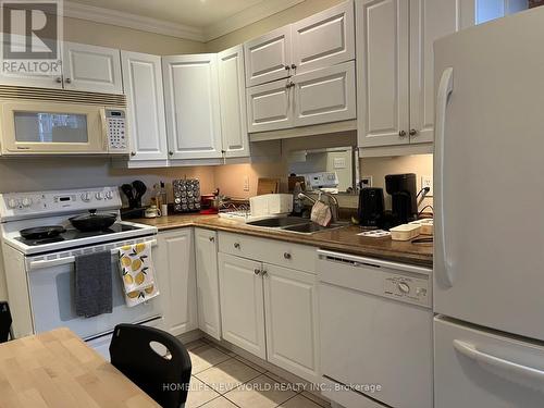 501 - 79 King Street W, Cobourg, ON - Indoor Photo Showing Kitchen With Double Sink