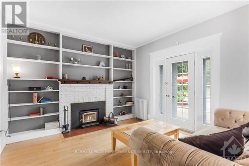 449 Mcgill Street, Hawkesbury, ON - Indoor Photo Showing Living Room With Fireplace