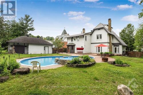 449 Mcgill Street, Hawkesbury, ON - Outdoor With In Ground Pool With Backyard