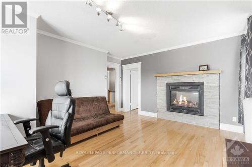 449 Mcgill Street, Hawkesbury, ON - Indoor Photo Showing Living Room With Fireplace