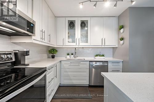 1004 - 2500 Bridletowne Circle, Toronto, ON - Indoor Photo Showing Kitchen With Upgraded Kitchen