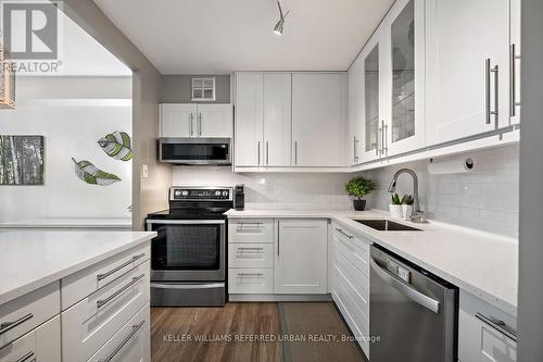 1004 - 2500 Bridletowne Circle, Toronto, ON - Indoor Photo Showing Kitchen With Upgraded Kitchen